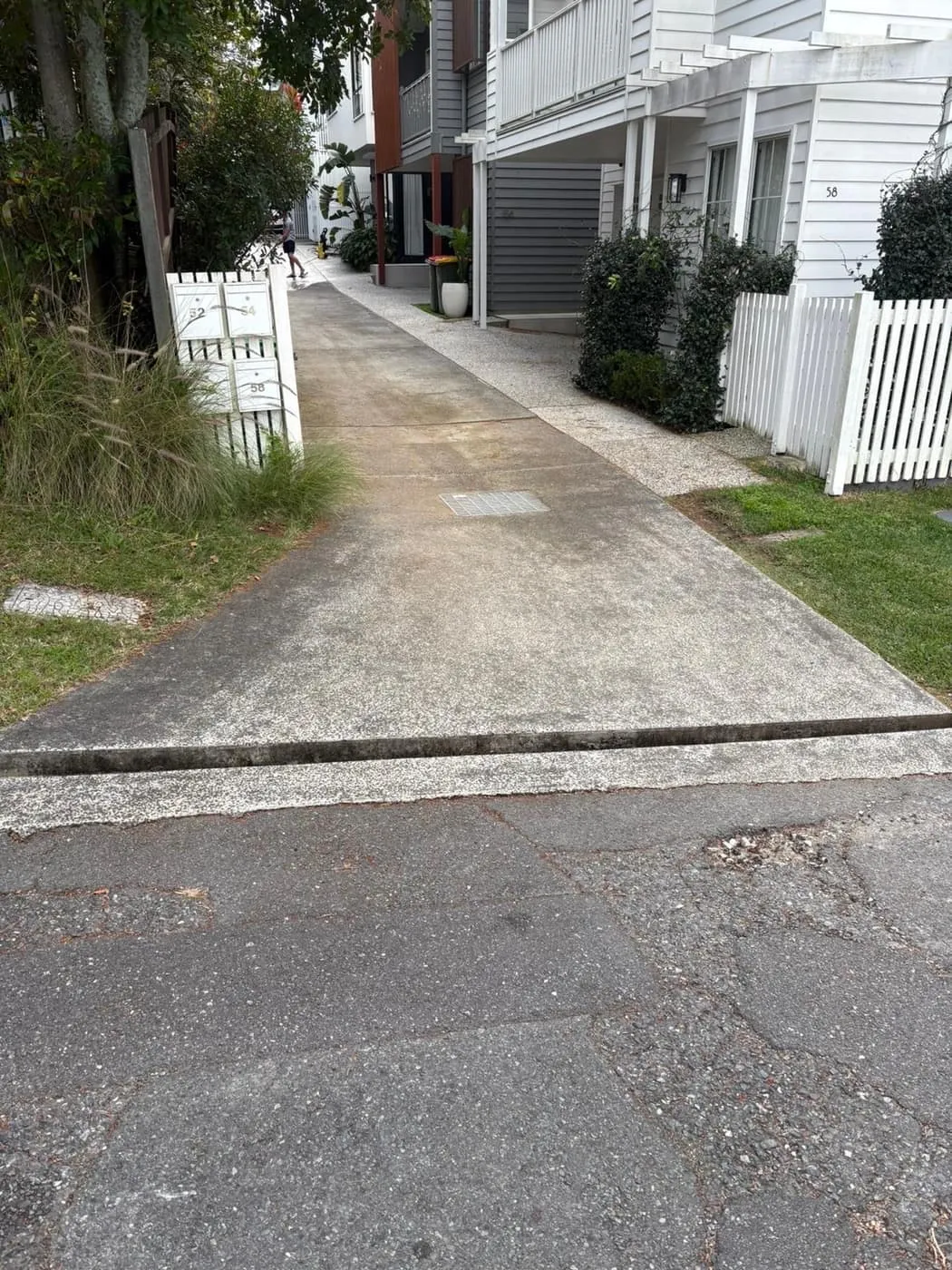 A cleaned entrance path and steps leading up to a Brisbane home.